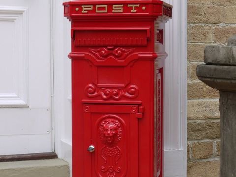 Victorian style red post box