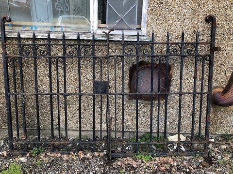 Set of traditional driveway gates with ornate scroll work