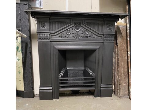 Original fully restored sunflower detail cast iron fireplace. FP299