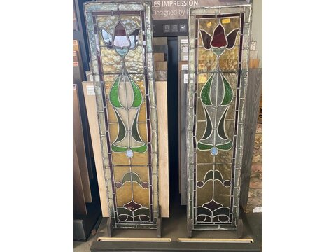 A beautiful pair of stained glass panels reclaimed from a large entrance