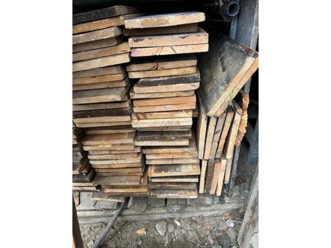 A large quantity of wide reclaimed pine  floor boards